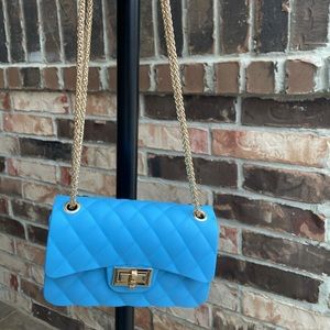 Rubber plastic bag purse mini